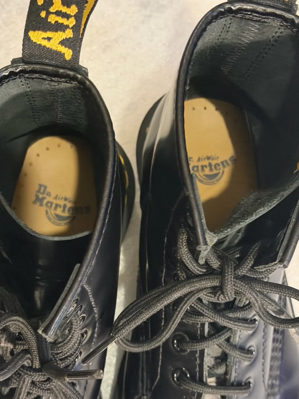Dr. Martens 1460 Smooth Black Leather Lace-Up Combat Boots with Yellow Stitching